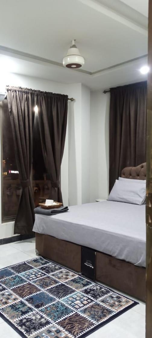 Northern Suites Bahria Town Ravalpindi Szoba fotó